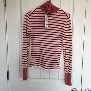 Long sleeved high neck, striped top.
